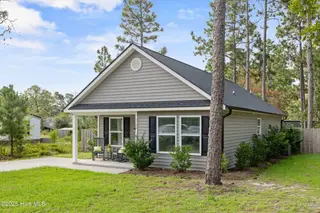 1138 Fifty Lakes Drive, Southport, NC 28461 – photo 2: Front Exterior (10)