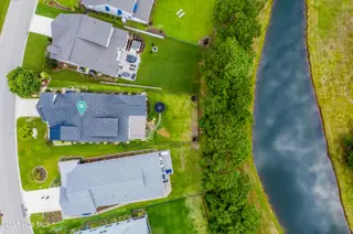 135 Spicer Lake Drive, Holly Ridge, NC 28445 – photo 3: Pond Front, Aerial View