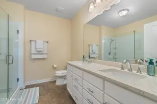 221 Woodlands Way Unit 21, Calabash, NC 28467 — 2-bedroom condo in Crow Creek, Calabash, NC, photo 15 of 39: Upgraded Primary Bathroom