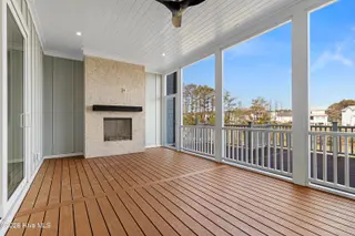 502 Swan Court, Beaufort, NC 28516 – photo 20: Screened in Porch with Fireplace