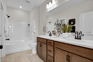 1218 Sunwater Terrace, Leland, NC 28451 — 4-bedroom townhome in Grand Park, Leland, NC, photo 19 of 49: Second Primary Bathroom - Hyacinth BE -