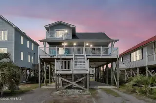 2519 W Dolphin Drive, Oak Island, NC 28465 – photo 1: 2-web-or-mls-_DSC1881 day to dusk