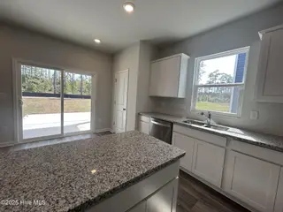 580 Coronado Avenue SE 19, Leland, NC 28451 – photo 8: Granite Countertops & White Cabinets