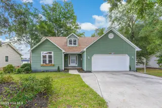 704 Shoreline Drive E, Sunset Beach, NC 28468 – photo 1: Front