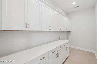 1545 St Lucia Drive SW, Shallotte, NC 28470 – photo 23: Laundry Room