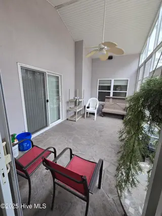 833 Fifty Lakes Drive, Southport, NC 28461 – photo 23: Back Closed in Patio
