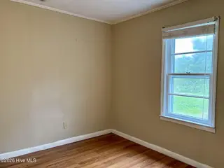 580 Gillikin Road, Beaufort, NC 28516 – photo 15: Bedroom 2 w/ LVP Flooring
