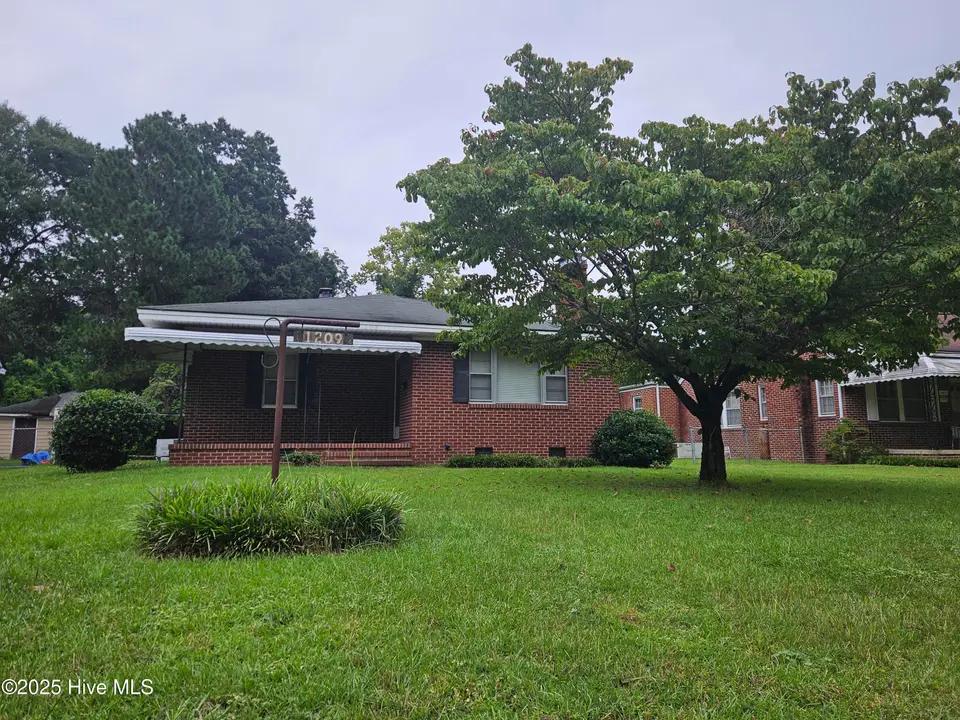 1209 E Holly Street, Goldsboro, NC 27530 – photo 1 of 2: Front View of Home