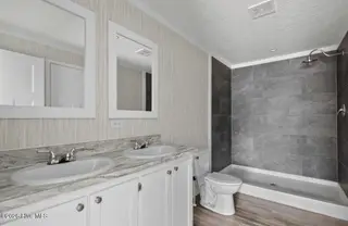 6823 Lewis Drive SE, Winnabow, NC 28479 – photo 18: Master bathroom