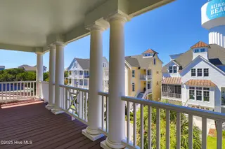 221 Sound Side Drive, Atlantic Beach, NC 28512 — 5-bedroom home in Bay Ridge, Atlantic Beach, NC, photo 8 of 60: Third floor covered porch
