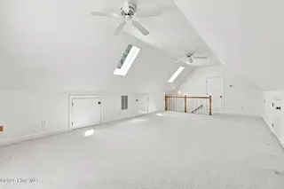 110 Sutton Drive, Cape Carteret, NC 28584 – photo 20: Skylights brighten bonus room over garag