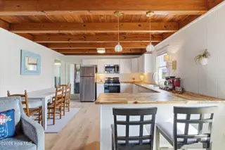 707 W Beach Drive, Oak Island, NC 28465 – photo 19: 10-Kitchen