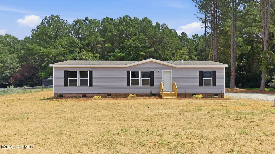 9757 Fire Tower Farm Road, Whitakers, NC 27891 – photo 1 of 48: 1-web-or-mls-DJI_20260820132050_0543_D-E