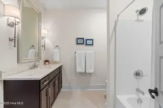 9279 Devaun Pointe Circle, Calabash, NC 28467 – photo 24: Second level guest bath
