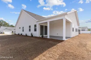 692 Edgeside Drive SE, Bolivia, NC 28422 – photo 19: Back Covered Patio