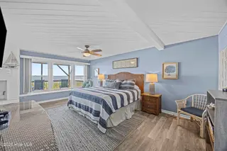 5127 W Beach Drive, Oak Island, NC 28465 – photo 12: 25_bedroom
