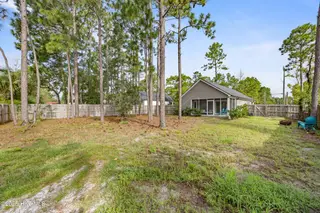 1138 Fifty Lakes Drive, Southport, NC 28461 – photo 22: Back Exterior (6)
