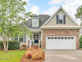 3918 Meeting Place Lane, Southport, NC 28461 — 4-bedroom home in Arbor Creek, Southport, NC, photo 1 of 57: front