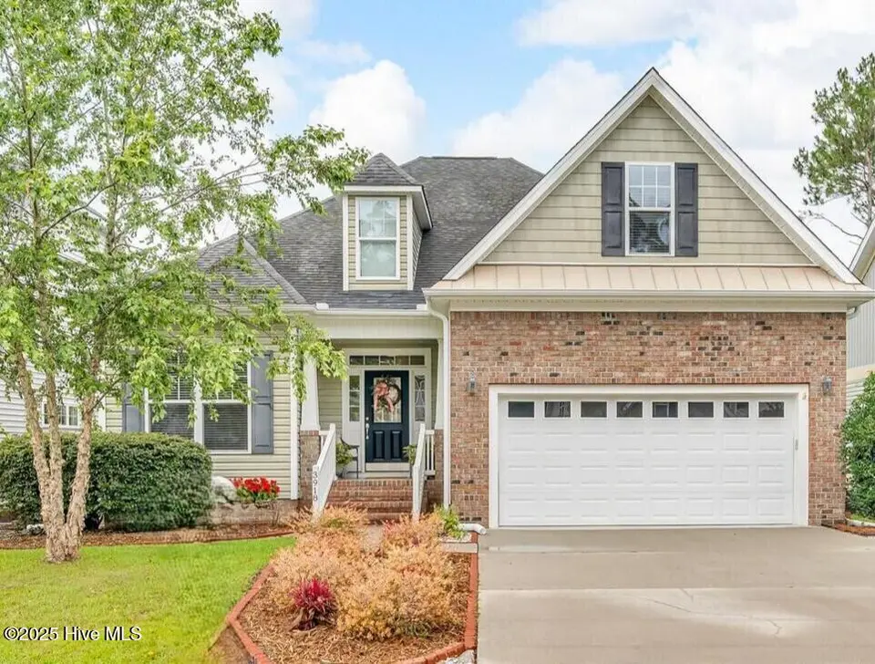 3918 Meeting Place Lane, Southport, NC 28461 — 4-bedroom home in Arbor Creek, Southport, NC, photo 1 of 57: front
