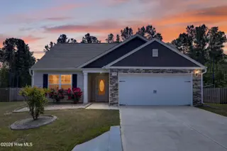 429 Poppleton Drive, Hampstead, NC 28443 – photo 1: 429PoppletonDrive-2_Dusk