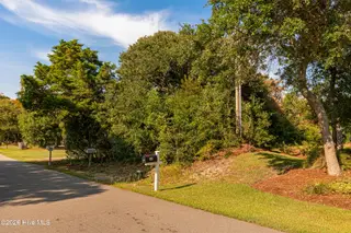 104 Juniper Road, Pine Knoll Shores, NC 28512 – photo 10: Vacant lot in Pine Knoll Shores