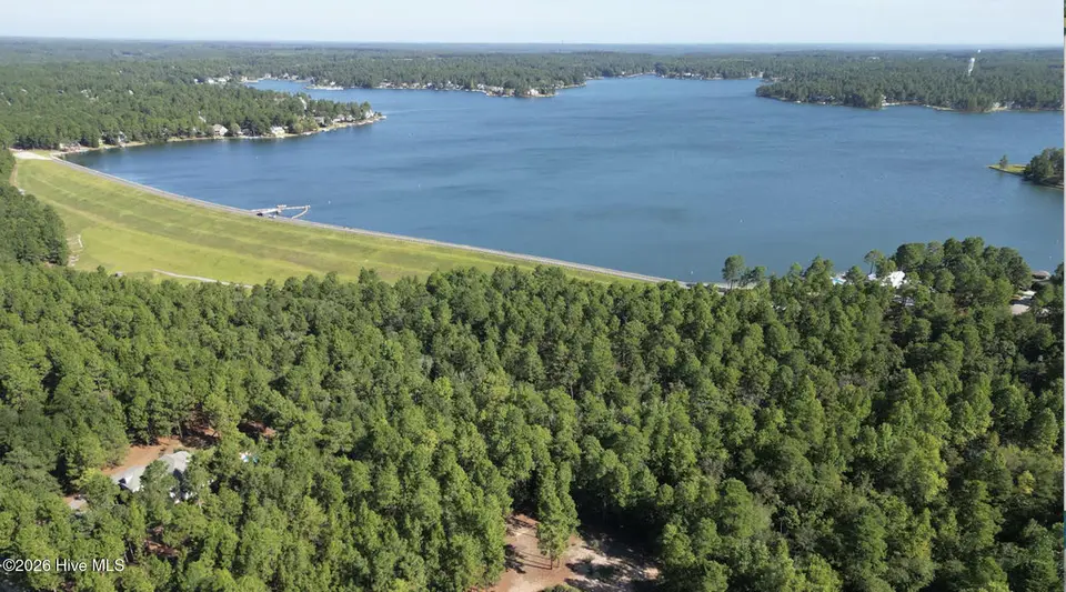 324 Longleaf Drive, West End, NC 27376 – photo 1 of 18: Lake Auman