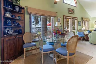 712 Canal Cove Road, Lake Waccamaw, NC 28450 – photo 15: Dining and Living Room Combination
