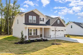 83 Tuskeegee Drive, Smithfield, NC 27577 – photo 2: 83 Tuskeegee Side view