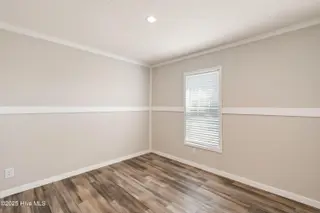 6745 Lewis Drive SE, Winnabow, NC 28479 – photo 21: Guest bedroom