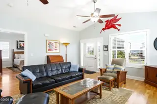 3702 E Dolphin Drive, Oak Island, NC 28465 – photo 9: shniderproductions.com-33