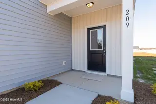 209 Shadow Grass Court, Stella, NC 28582 – photo 8: Porch