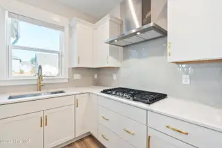 1368 Trisail Terrace, Wilmington, NC 28412 – photo 21: 1368 Trisail stove and hood vent