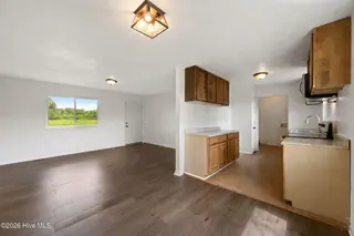 3833 Nc Hwy 903, Rose Hill, NC 28458 — 3-bedroom home, Rose Hill, NC, photo 12 of 33: 19-web-or-mls-Kitchen LR