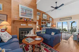 590 Westport Drive H1 Westport, Pine Knoll Shores, NC 28512 – photo 10: Living room with sound views