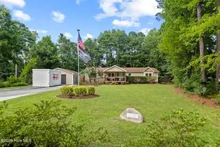 408 Quailridge Court, Peletier, NC 28584 – photo 2: 425A3545