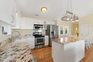 6611 Marsh Cove Road, Emerald Isle, NC 28594 – photo 13: Kitchen with granite countertops