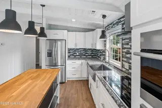 7705 E Oak Island Drive, Oak Island, NC 28465 – photo 16: 417 N 21st St MLS-15