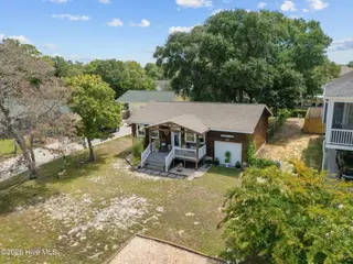 132 NE 3rd Street, Oak Island, NC 28465 – photo 4: 7-web-or-mls-DJI_20250730114211_0822_D