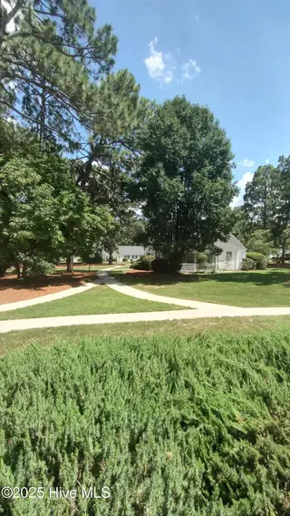 51 Village Green Circle, Southern Pines, NC 28387 – photo 8: Front Exterior Greenspace