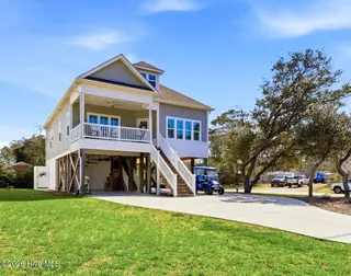 202 NE 64th Street, Oak Island, NC 28465 – photo 2: Welcome to 202 NE 64th St