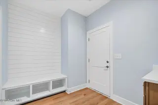 137 NE 3rd Street, Oak Island, NC 28465 – photo 23: Laundry/ Mud room area