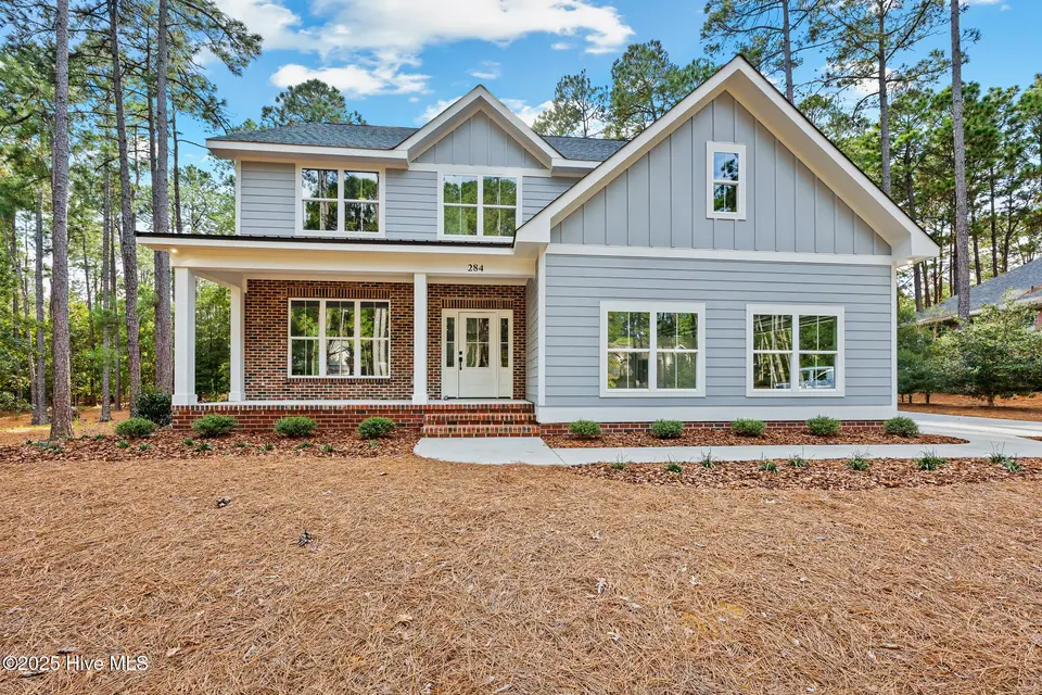 284 Longleaf Drive, West End, NC 27376 – photo 1 of 39: Front Elevation
