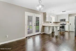 302 N Pointe Drive, Goldsboro, NC 27530 – photo 16: Dining Area Into Kitchen