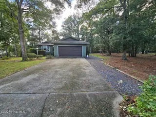 3235 Marsh View Drive SW, Supply, NC 28462 — 3-bedroom home in Lockwood Folly, Supply, NC, photo 2 of 36: Front of House