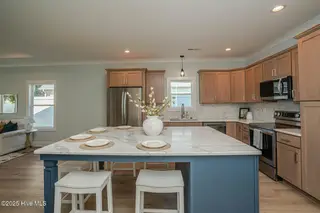 137 NE 3rd Street, Oak Island, NC 28465 – photo 6: Kitchen Island