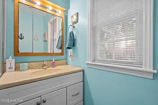 114 NE 50th Street, Oak Island, NC 28465 – photo 23: 33-web-or-mls-DSC04112