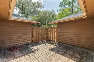 608 Camellia Lane, Sunset Beach, NC 28468 – photo 3: Courtyard 1A