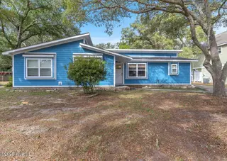 209 NE 56th Street, Oak Island, NC 28465 – photo 1: 02-Final 209 NE 56th St OKI-RJREM-9368