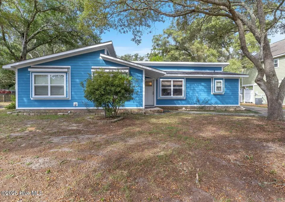 209 NE 56th Street, Oak Island, NC 28465 – photo 1 of 41: 02-Final 209 NE 56th St OKI-RJREM-9368