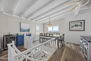 5127 W Beach Drive, Oak Island, NC 28465 – photo 9: 30_dining area